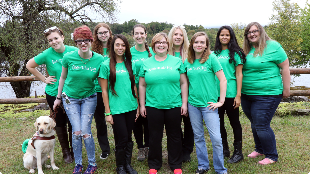 group of women in green shirts