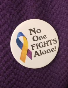 no one fights alone button