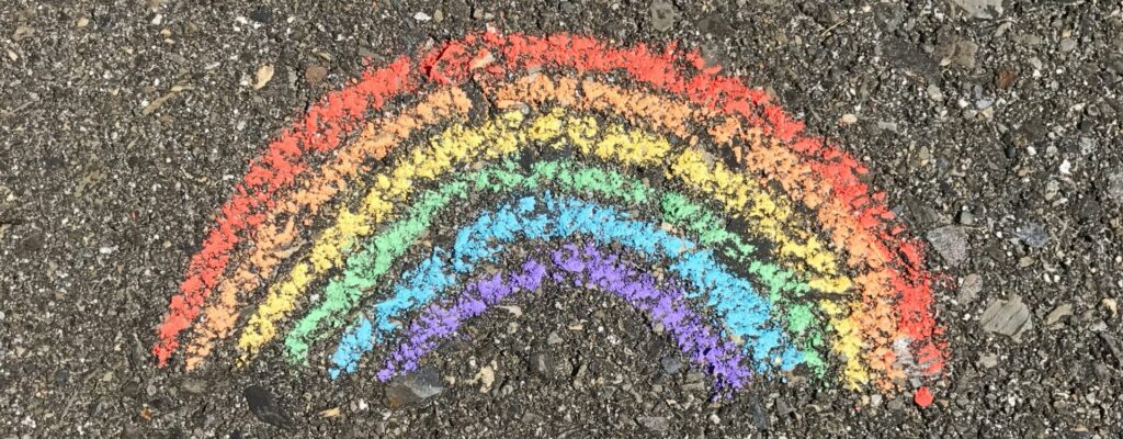 a rainbow on a concrete background.