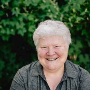 A decorative photo of the author, Sue Phillips.